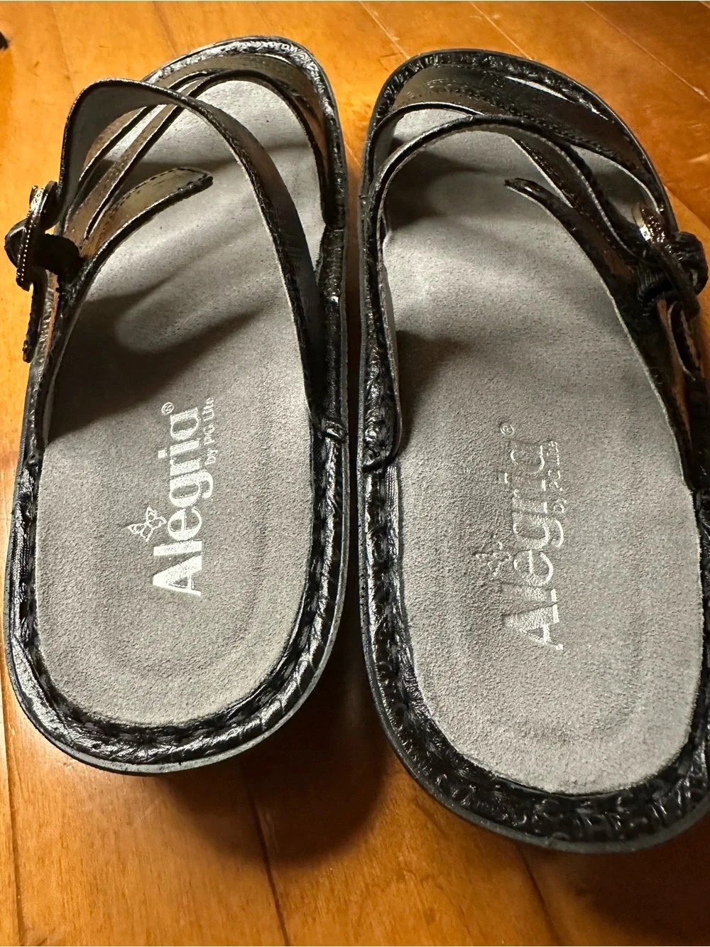 Alegria Black Embossed Leather Slide Sandals with Decorative Medallions